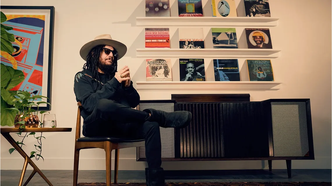 2025 02 Donlisteninginfrontofrecordwall